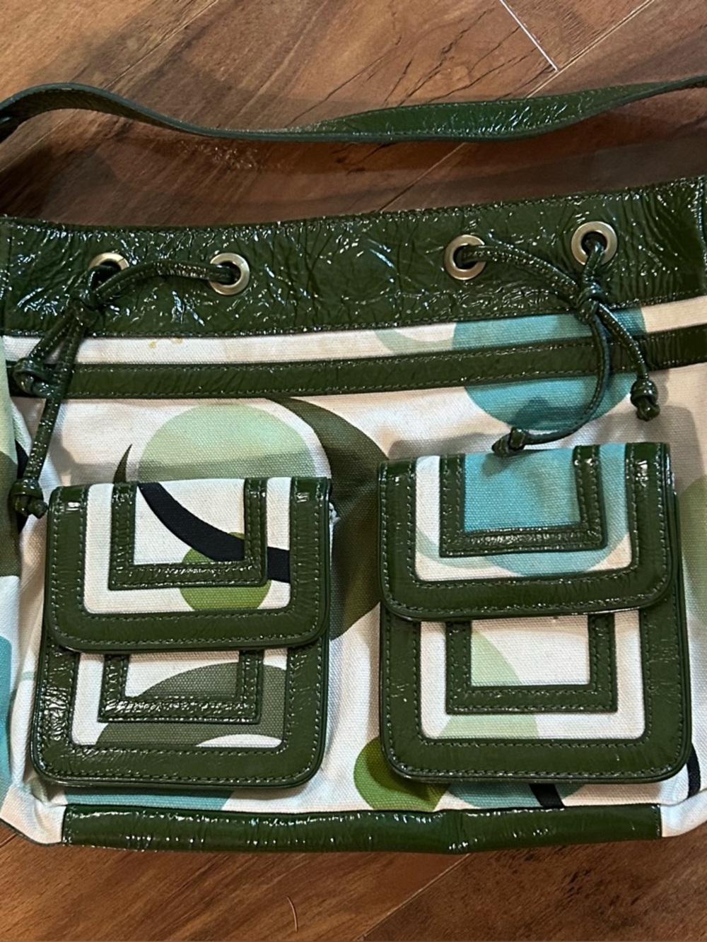 Kate Landry Green Patterned Shoulder Bag with Dual Front Pockets. Note* stains
